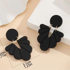 These Elegant Black Earrings Feature A Beautiful Carved Pattern That Adds A Touch Of Sophistication To Any Outfit. The Dangle/Drop Style Is Perfect For Adding A Pop Of Style To Your Jewelry Collection, And The Black Color Complements Any Outfit. Ideal For Any Occasion, These Earrings Are A Must-Have For Any Fashion-Forward Individual. Perfect For Those Who Love To Make A Statement With Their Accessories, These Earrings Are Sure To Impress. Pottery Texture, Earrings Acrylic, Summer Earrings, Color Complement, Acrylic Designs, Black Acrylic, Black Acrylics, Black Earrings, Earring Patterns