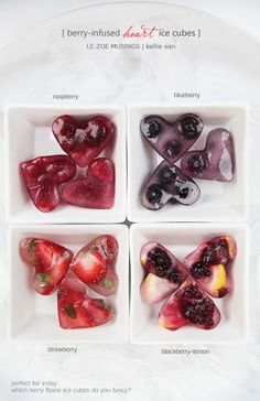 four small white dishes filled with different types of fruit in each one's heart shape