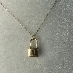 Lock In A Fabulous Look With This Padlock Pendant Necklace. -14k Yellow Gold -16.5"+2" -Made In Italy 14k Gold Jewelry With Gold Clasp For Anniversary, Luxury Lock Jewelry For Gift, Classic Necklace With Gold Clasp For Gift, Classic Gold Clasp Necklace For Gift, Classic Necklaces With Gold Clasp For Gifts, Formal Gold Jewelry With Lock, Classic Gold Lock Jewelry, Classic Gold Jewelry With Lock Detail, 14k Gold Jewelry With Gold Clasp For Gift