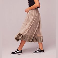 Elastic Waist Velvet Hem Detail Fluid A-Line Silhouette Mesh Overlay Taupe Pleated Slip Skirt Lining Midi Length True To Size Model Measurements: 5'10" Height, 33.5" Bust, 23.5" Waist, 34.5" Hips, Wearing A Size Small 100% Polyester Hand Wash A Twist On The Usual Midi Skirt, Band Of Gypsies’ Tiny Dancer Midi Skirt Offers A High Waist And Is Fully Lined With A Mesh Overlay. Pair With Your Favorite Sweater And Booties For An Updated Fall Look. Velvet Pleated Skirt, Floral Print Maxi Skirt, Floral Shirt Women, Distressed Jean Skirt, Maxi Skirt Boho, Slip Skirts, Wrap Maxi Skirt, Womens Maxi Skirts, Tiny Dancer