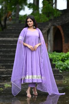 PRODUCT DESCRIPTION :-Shine bright like sunshine!Anarkali :- Pure cottonPant :- CottonDupatta :- Organza silkClosure Used:- Side zipColor:- Lilac purpleCare Instructions :- Dry clean onlyModel Size :- Model is wearing XS sizeModel Height :- 5.5DISCLAIMER :- Slight color variations may occur due to different screen resolution. Purple Churidar With Gota Work, Purple Straight Kurta With Sheer Dupatta, Traditional Drape Purple Salwar Kameez With Gota Work, Traditional Purple Gota Work Salwar Kameez, Purple Anarkali Style Sharara With Cutdana, Purple Straight Kurta Anarkali Set For Wedding, Purple Anarkali Set With Straight Kurta For Wedding, Anarkali Purple Kurta For Navratri, Anarkali Style Purple Kurta For Navratri