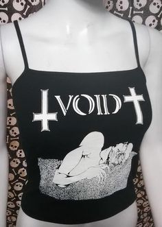 This is a black Void crop tank top with spaghetti straps. This has a Void image screen printed on the front. 56% cotton/ 38% polyester/ 5% SpandexThese are handmade screenprinted and slightly vary from the photo. Please feel free to email me any questions. Thanks for looking.Due to an influx of incorrect addresses if a package is returned,  you must pay the shipping cost to resend the item to you.I do not do exchanges and I do not take returns unless the item is damaged. I thoroughly check each Fitted Punk Style Cotton Crop Top, Summer Emo Cotton Tops, Summer Cotton Emo Style Tops, Summer Emo Style Cotton Tops, Fitted Grunge Tank Top With Graphic Print, Black Cotton Band Merch Crop Top, Summer Band Merch Cotton Crop Top, Band Merch Cotton Crop Top, Alternative Black Cotton Crop Top