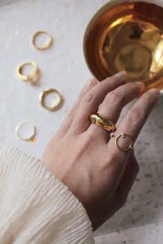 Paloma Gold Fill Dome Ring is a chunky gold ring that has a sculptural round shape. Minimal and elegant. This ring has a weight to it. Silver version: https://etsy.me/3aksajx ◊ 18K Gold Filled ◊ 100% Nickel Free ◊ Delivered in our signature blue box from Seoul SAY HI TO US Instagram: @thepinablue Pinterest: https://www.pinterest.com/thepinablue Facebook: https://www.facebook.com/thepinablue/ #pinablue Thick Gold Band, Gold Dome Ring, Ring Minimal, Vintage Gold Rings, Stacking Ring Set, Gold Statement Ring, Dome Ring, Animal Rings, Birthday Gifts For Girlfriend