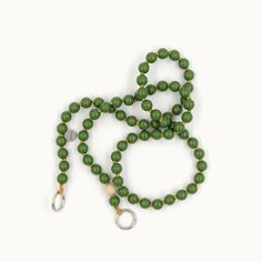 The Olive Green crossbody beads chain by UpBeads is a stylish and elegant accessory that features beautiful green beads and a convenient crossbody cord. Made with high-quality materials and exceptional craftsmanship, this accessory is perfect for fashion-conscious individuals who want to add a touch of sophistication to their wardrobe. With its unique design and sturdy construction, the Olive Green crossbody beads chain by UpBeads is an excellent accessory for any occasion. Our cell phone chains Phone Chains, Plant A Tree, Sustainable Forestry, Beads Chain, Toxin Free, Green Beads, Elegant Accessories, Green Bead, Beaded Chain