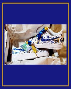 *PLEASE READ FULL DESCRIPTION BEFORE PURCHASE* Embellishments: No two shoes will be exact. If you see a feature that you really like, make sure you request that feature. Each shoe will be uniquely embellished differently. Shoes picture features Royal Blue & Gold Butterflies, Pearls & Swarovski Crystals. Double laces .5-inches or single lace 1.5-inch ribbon will be used. (preference can be requested) But it can be designed in your theme & colors! ~DYED OR PAINTED MID-SECTIONS/ SHOES: Dye soaks in Custom Nike Air Force 1, Custom Nike Air Force, Custom Nike Air, Play Shoes, Embellished Shoes, Satin Shoes, Custom Nike, Royal Blue And Gold, Nike Brand