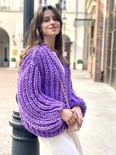 "Meet Crochet cardigan super fluffy, chunky knit cardigan! Unique designed long sleeves. This purple chunky sweater is made with great love and care. Oversized sweater in purple color would look perfect as part of your look. Hand knitted cardigan can be worn as casual coat for a walk, on traveling or any other occasion. This cardigan would look perfect any time of the year. This elegant, soft and warm crochet cardigan is made of wool blend yarn. Knitted with finest wool blend (50 % wool, 50% acr Trendy Spring Cardigan With Ribbed Cuffs, Trendy Chunky Knit Sweater Coat For Spring, Trendy Oversized Knitted Outerwear, Trendy Long Sleeve Knitted Cardigan, Trendy Oversized Knitted Cardigan, Knitted Long Sleeve Spring Outerwear, Knitted Long Sleeve Outerwear For Spring, Spring Long Sleeve Knitted Outerwear, Spring Long Sleeve Knit Outerwear