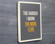 a sign that says the harder i work, the more i live