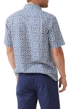 Mediterranean tiles inspire the ocean-blue patterns on a shirt made of linen and cotton in a fit that's perfect for relaxing on warm, sunny days. 31" length; 45" chest (size Medium) Front button closure Spread collar Short sleeves Chest patch pocket 65% linen, 35% cotton Machine wash, line dry Imported Blue Linen Camp Shirt With Relaxed Fit, Blue Relaxed Fit Linen Camp Shirt, Blue Linen Camp Shirt For Vacation, Blue Linen Camp Shirt For Spring, Spring Blue Linen Camp Shirt, Blue Cotton Tops With Ikat Print, Blue Block Print Relaxed Fit Top, Blue Relaxed Fit Top With Block Print, Blue Ikat Print Top For Summer