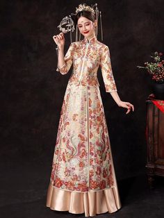 ⭐ Premium Handmade Item, High End Quality Gown; The very Elegant quality for Brides; ⭐ Item High Light: Classical Red Color; 4D Solid Tailor to Show Bride's Shape Beauty; Premium Satin Material Surface; Embroidery Golden Pattern盘金绣; Tassel jewelry decoration in front Chest and Sleeves/ Hemline; Tassel Satin with Pattern Skirt; Symmetrical Art design to show the beauty of Chinese Royal Wedding Fashion. ⭐ Made for Spring/Summer/ Autumn Season; Clothing Match Tips: Match to Loose Qipao Jacket/ High Chinese Wedding Guest Outfit, A-line Wedding Dress With Intricate Embroidery, Traditional A-line Embroidered Dress, Fitted Multicolor Gown For Traditional Ceremonies, Floral Print Embroidered Maxi Dress For Wedding, Fitted Floor-length Gown With Multicolor Embroidery, Ceremonial Dresses With Floral Embroidery, Brocade Wedding Dress With Gold Embroidery, Long Floral Print Dress For Wedding