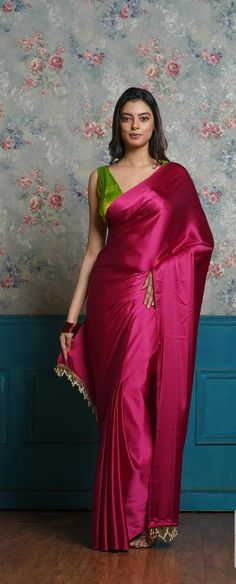 For More Latest Trending Women's outfits Just Click on the below link, https://www.etsy.com/in-en/shop/PIXAWORLD 👉Saree * Fabric :- Premium Satin Silk. * Embellishment :- Beautiful Handmade Pearl Tassels on Pallu. * Color :- As shown. * Length :- 5.5 Mtr. 👉Blouse (0.80 Mtr. - Un-stitched) * Fabric :- Premium Satin Silk. * Color :- As Shown. * Embellishment :- Plain. * Wash Care :- First Wash Dry Clean. * Quality:- Quality Product. * Occasion:- Festival, Party-wear, Wedding, Ceremony. Made to M Hot Sarees Party Wear, Rani Pink Saree Contrast Blouse, Satin Saree Look, Satin Saree Party Wear, Plain Saree Blouse, Pink Satin Saree, Dark Pink Saree, Satin Saree Blouse, Cocktail Saree