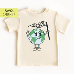 Kids Earth Day Shirt, Retro Earth with Peace Flag T-Shirt, Cute Boho Graphic Tee (NATURAL SHIRT) PRODUCTION TIME Little Spunkies from the designer/owner of Spunky Pineapple Co https://www.etsy.com/shop/SpunkyPineappleCo   All baby and toddler clothes are 100% designed and printed with water based ink.  All orders placed before 12:00 pm EST are shipped out same day (Monday - Friday).  Orders received after noon are shipped out the next business day. ONESIE®  Please see images for size chart detai Pre-shrunk Organic Cotton Short Sleeve Shirt, Fun Slogan T-shirt For Everyday, Cute Organic Cotton Crew Neck T-shirt, Cute Everyday T-shirt With Slogan, Cute Everyday T-shirt With Screen Print, Playful Letter Print Tops For Everyday, Playful Everyday Tops With Letter Print, Relaxed Fit Letter Print Tops For Earth Day, Playful Slogan Crew Neck T-shirt