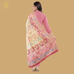 Add a dash of color to your ethnic look with this beautiful Banarasi dupatta from our Birds of Paradise collection. The dupatta is made of pure Georgette silk and has the illustrious bird motifs weave on it. Jaal weave is inherent to Banarasi weaving and this Handloom Banarasi Silk Dupatta is the epitome of the craftsmanship of the renowned weavers of Banaras. Designer Multicolor Embroidered Jamawar Dupatta, Traditional Embroidered Silk Scarf, Traditional Multicolor Designer Dupatta, Traditional Jamawar Dupatta Shawl, Traditional Paithani Silk Dupatta For Designer Wear, Designer Gold Dupatta With Meenakari, Gold Anarkali Style Paithani Silk Dupatta, Traditional Shawl Dupatta For Transitional Season, Multicolor Embroidered Tussar Silk Dupatta With Motifs