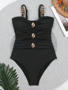 Turn heads at the beach with our Colorblock Cut-Out One-Piece Swimsuit. This sexy, plain-patterned swimsuit features eye-catching cut-out details and a flattering bikini bottom type. Designed with a wireless bra for comfort, it has spaghetti straps and a sleeveless cut for a sleek, modern look. Made from high-stretch knitted fabric, this short-length swimsuit ensures a perfect fit and ease of movement. Perfect for making a bold statement by the pool or on the sand. Composition: 80% Polyamide, 20 Backless Tankini For Beach Season Party, Beach Season Party Tankini, Backless Beachwear Tankini For Party, Chic Solid Color Beach Tankini, Chic Solid Color Swimwear For Beach Season, Chic Solid Swimwear For Beach Season, Solid Color One Pieces For Beach Season Party, Solid Color One Piece For Beach Season Party, Solid One Piece For Beach Season Party