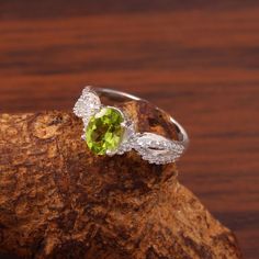 Peridot Ring, Natural Peridot Ring, Wedding Ring, Green Stone, Oval Cut Stone Ring, August Birthstone, Brides Ring, Engagement Ring Gift Her Stone Name: Natural Peridot Shape : Oval Stone Size : 6x8 MM Metal : 925 sterling silver finished with Rhodium nickel free Beautifully handcrafted as u can see in pics100% handmade more quantity available on demand We accept Custom Order If you have any questions about this piece or if we can help you with any of our other products please feel free to conta Oval Peridot Rings Fine Jewelry, Oval Peridot Rings With Accent Stones, Oval Peridot Birthstone Ring For Anniversary, Oval Peridot Wedding Ring, Oval Peridot Ring With Center Stone, Round Peridot Crystal Wedding Ring, Peridot Crystal Ring For Anniversary, Peridot Crystal Ring For Wedding, Peridot Crystal Wedding Ring