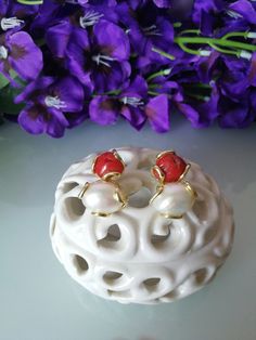 Elegant stud earrings with natural white baroque pearl and natural red coral from the Mediterranean, handcrafted gold plated silver setting. Measure length 2cm. Elegant Orange Earrings With Natural Stones, Formal Red Pearl Earrings With Matching Set, Unique Red Wedding Earrings, Red Pearl Drop Earrings As Gift, Red Drop Pearl Earrings For Gift, Red Pearl Drop Earrings For Gift, Elegant Coral Colored Red Coral Earrings, Red Pearl Drop Earrings, Unique Red Earrings For Formal Occasions