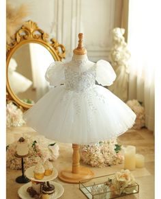 Get 10% off now! Buy princess white tulle beaded flower girl dress ballgown with bubble sleeves at cheap price online. Free stable shipping and pro custom service since 2009. White Princess Tutu Dress With Short Sleeves, White Organza Tutu Dress For First Communion, White Princess Organza Pageant Dress, White Princess Pageant Dress In Organza, White Princess Dress With Pearl Embroidery, White Princess Style Organza Pageant Dress, White Princess Style Pageant Dress In Organza, White Tulle Pageant Dress For First Communion, Tulle Princess Dress For First Communion