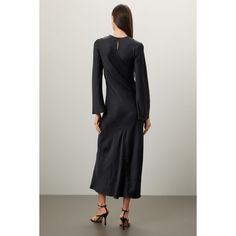 Black satin (52% Lenzing‚Ñ¢ Ecovero‚Ñ¢  Viscose, 48% Viscose). Shift. Long sleeves. Crewneck. Back button closure. 32" from shoulder to hemline. Imported. Fitted Satin Dress For Workwear, Fall Satin Workwear Dress, Fall Workwear Satin Dress, Sleek Long Sleeve Satin Midi Dress, Chic Satin Dress For Spring Workwear, Black Satin Finish Dress For Dinner, Satin Long Sleeve Silk Dress For Work, Long Sleeve Silk Satin Dress For Work, Long Sleeve Satin Silk Dress For Work