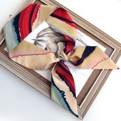 Hand painted designer silk scarf by Nevena Filkina. Small pure silk scarf for neck, hair, purse, head in beige, red-orange, gray, light olive.  Double-faced scarf, professional dyes HDupont. HAND-PAINTED on 100% silk  Short skinny scarf for a lived-in luxury feel, fall in a fluid line against the body. Loop at the neck, use as a hair band or bag accessory. Wear it knotted around your neck or tied to a favourite tote. A smart way to add a showy accent to your look - a small bag silk scarf - impressive result! Perfect for any seasons. ONE of a KIND original artwork on 100% Silk. WEAR as: - hair scarf - hair ribbon - neck scarf - hand band - Ponytail Hair Scarf - Headband - sash belt - bag scarf - wrist scarf - choker scarf - bun scarf - purse scarf - hat band - sash scarf MATERIAL: 100% Silk Hair Silk Scarf, Scarf Bun, Designer Silk Scarves, Purse Scarf, Pure Silk Scarf, Scarf Material, Hand Painted Silk Scarf, Hair Scarf, Scarf Headband