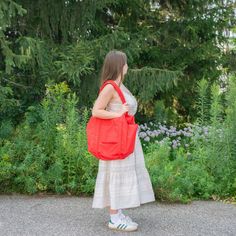 A travel bag optimized for flying: it fits under an airplane seat, on top of your roller bag, and on your shoulder. Exterior pockets keep your travel essentials within reach, including a tech pocket that fits up to a 16” laptop, and side pockets for your water bottle and boarding pass. The bag packs down into its interior detachable pouch for easy storage. If there's one thing we all agree on at Golden Rule, it's that Baggu is essential. Form and function meet in this eco carry-all that works ha Travel Backpack With Water Bottle Pocket, Travel Tote Bag With Water Bottle Pocket, Casual Travel Shoulder Bag With Water Bottle Pocket, Versatile Packable Bag For Trips, Casual Packable Backpack For On-the-go, Casual Packable Bags For Weekend Trips, Casual Packable Travel Bag, Functional Packable Shoulder Bag For Travel, Casual Large Capacity Travel Accessories For Trips