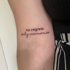 a woman's arm with the words no regents my memories written on it