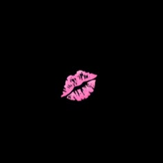 a pink lip on a black background