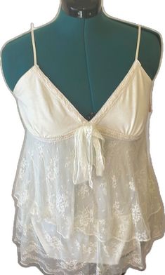 White Feminine Camisole, White Feminine Tank Top, White Feminine Camisole Tank Top, White Tank Top With Lace Trim, White Lace Camisole Tank Top, White Camisole Tank Top For Daywear, White Lace Tank Camisole, White Feminine Sleeveless Tank Top, White Lace Top Tank Camisole