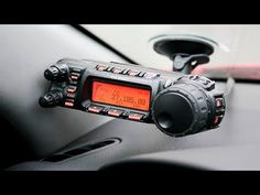 a car radio sitting on top of a dashboard