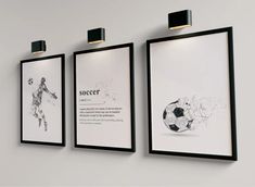 three black and white pictures hanging on the wall next to each other with soccer balls