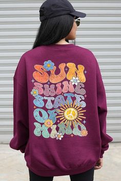 Sunshine State of Mind Back Graphic Fleece Sweatshirts.Unisex Crew Neck Long Sleeve Sweaters Knits.Crafted from premium materials, tailored to your lifestyle, ensuring a comfortable fit for any occasion.Family Group Uniforms Birthday Party Gift Concert Festival Events.High Quality Direct To Film Printed Graphic Design.50%COTTON,50%POLYESTERNICARAGUAMade In: Nicaragua Purple Winter College Tops, Purple Winter Tops For College, Purple Crew Sweatshirt For Fall, Purple Fleece Crew Neck Sweatshirt, Graphic Print Fleece Sweatshirt For Leisure, Purple Relaxed Fit Sweatshirt With Graphic Print, Leisure Fleece Sweatshirt With Graphic Print, Casual Purple Sweatshirt With Letter Print, Purple Relaxed Fit Graphic Print Sweatshirt