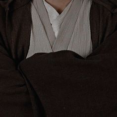 a close up of a person wearing a robe