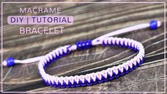 the macrame diy bracelet is made with purple and white beads on a wooden table