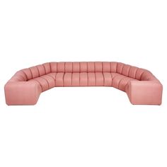 a pink sectional sofa on a white background