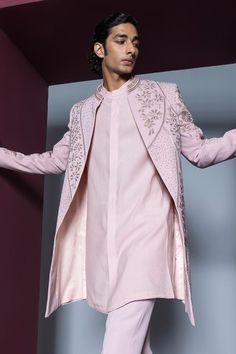 Pale pink open sherwani with heavy dori and glass bead embellishments all over. Paired with a kurta and pant.
Components: 3
Pattern: Embroidered
Type Of Work: Dori, Glass Bead
Neckline: Band collar
Sleeve Type: Long
Fabric: Japanese Suiting
Color: Pink
Other Details: 
Approx. product weight: 1.5 kgs
Occasion: Wedding - Aza Fashions Festive Semi-stitched Embellished Sherwani, Festive Embellished Semi-stitched Sherwani, Embellished Sherwani With Traditional Drape For Designer Wear, Traditional Embellished Semi-stitched Sherwani, Embellished Sherwani For Designer Wear With Traditional Drape, Embellished Unstitched Sherwani For Eid, Bollywood Style Embellished Sherwani With Traditional Drape, Traditional Embellished Sherwani For Festive Occasions, Traditional Embellished Bandhgala For Festive Season