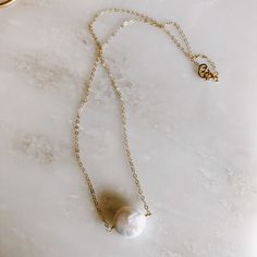 Dainty chain with freshwater pearl coin. Available in 14k gold fill or sterling silver. 16” or 18" length. Everyday 14k Gold-filled Pearl Charm Necklaces, Everyday Pearl Charm Necklace, Everyday 14k Gold-filled Pearl Necklace With Delicate Chain, Dainty 14k Gold Filled Pearl Necklace For Everyday, Everyday White 14k Gold Filled Pearl Necklace, Everyday 14k Gold Filled Jewelry With Pearl Pendant, Everyday Pearl Necklace With Adjustable Chain, Everyday 14k Gold Filled Pearl Drop Charm Necklace, Everyday White 14k Gold-filled Pearl Necklace