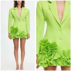 Introducing The Hampstead Blazer Dress In French Lime, A Sophisticated And Stylish Piece Crafted From Woven Structured Fabric. This Drop Shoulder Blazer Dress Features A Frill Detail At The Hem, Adding A Touch Of Elegance. The Centre Front Is Adorned With Covered Buttons For A Polished Look, Complemented By Front And Back Storm Flaps That Enhance The Structured Silhouette. Fully Lined For Comfort And Quality, This Blazer Dress Is Both Chic And Versatile, Perfect For Transitioning Seamlessly From Spring Fitted Mini Dress For Formal Occasions, Formal Green Mini Dress With Ruffles, Spring Formal Green Dress, Green Feminine Formal Dress, Elegant Green Mini Dress For Garden Party, Green Long Sleeve Mini Dress For Wedding, Elegant Green Mini Dress For Spring, Elegant Green Spring Mini Dress, Fitted Feminine Green Mini Dress