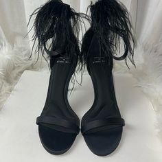 Gianni Bini X Nastia Liukin Ostrich Feather Stiletto Dress Sandals Matte Satin Fabric Upper Ostrich Feather Detailing On Back Counter Ankle Buckle Closure Color Black Size 9.5 Approx. 3.94" Heel Height Nwob High Heel Sandals With Feather Trim For Summer, Summer High Heel Sandals With Feather Trim, Summer Heels With Feather Trim And Round Toe, High Heel Sandals With Feather Trim For Spring, Chic Sandals With Feather Trim, Fitted Block Heel Sandals For Evening, Spring High Heel Sandals With Feather Trim, Chic Evening Sandals, Chic Feather Trim Sandals