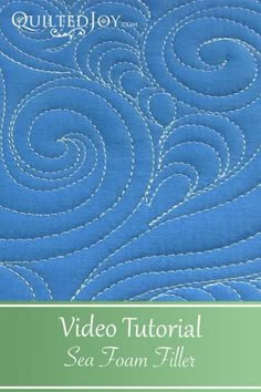 the quilted joy video pattern is shown in blue and has swirls on it