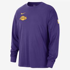 the los angeles lakers nike long - sleeve tee is shown in purple