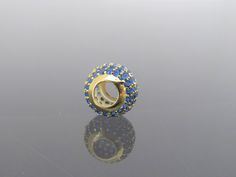 Vintage 18K Solid Yellow Gold Blue Sapphire Ball Slide Pendant...Marked 18K...Total of weights 1.4gramsWith 48 Blue Sapphire's 1.5MM ( .01ct x 48 = .48ct ) Measure of Ball 7.5 x 10MM ...It's in very good condition. #462392 Gold Sapphire Jewelry With Pave Setting, Blue Cubic Zirconia Jewelry With Pave Setting, Luxury Blue Rondelle Jewelry, Blue Round Jewelry With Pave Setting, Blue Round Beads Jewelry For Anniversary, Solid Yellow, Pendant Necklaces, Blue Sapphire, Sapphire Ring