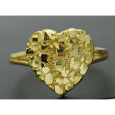 Our Nugget Heart Rings Are Fashionable And Comfortable To Wear. Our Real Solid 10k Yellow Gold Womens Nugget Heart Ring 1.8 Grams All Sizes Are Sure To Make The Perfect Gift For A Loved One. It’s Time To Celebrate The Love That You Partake With Your Loved Ones With These Beautifully Crafted And Intricately Designed Classic Rings. Hurry! Get Yours Today! Specifications: Metal: Real 10k Solid Yellow Gold (Stamped, 10k) Condition: Brand New Finish: Polished Total Gram Weight: 1.8 Grams Width: 12.7m Gold Nugget Jewelry, Gold Nugget Ring, Unique Gold Rings, Classic Rings, Heart Rings, Y2k Accessories, 10k Gold Ring, Golden Jewelry, Gold Nugget