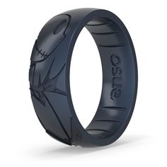 an image of a black ring with batman symbol on the inside and logo engraved on the outside