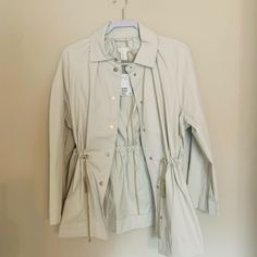 Small H&M Beige Jacket With Wider Sleeves And Cute Waist-Cinching Capabilities! Never Worn, Would Be Great For Spring, Fall And Rainier Days. Casual Cream Outerwear From H&m, Casual Cream Outerwear By H&m, Spring Neutral Button-up Utility Jacket, Beige Utility Outerwear For Summer, Summer Beige Utility Outerwear, H&m Beige Outerwear For Spring, H&m Cream Outerwear For Spring, Cream H&m Outerwear For Spring, H&m Cream Spring Outerwear