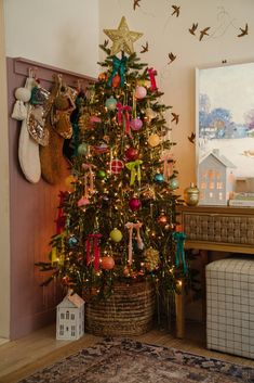 a decorated christmas tree in a living room