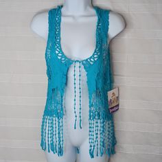 Nwt Room Mates Crochet Teal Blue Boho Hippie Vest With Tassels Size Medium. Mesh, Crochet And Tassels In The Same Color Make Up The Beautiful Vest. From A Non-Smoking Home. Blue Bohemian Crochet Top, Blue Cotton Crochet Lace Top, Blue Cotton Crochet Top For Festival, Casual Blue Crochet Lace Top, Blue Crochet Lace Top For Spring, Blue Beach Top With Crochet Trim, Bohemian Blue Crochet Top With Crochet Trim, Blue Bohemian Top With Crochet Trim, Blue Sleeveless Top With Crochet Trim