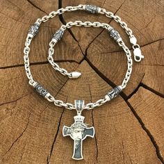 Silver set. 1️⃣ Silver anchor chain with 6 Orthodox inserts of the Faces of Saints ✔️Weight 70 grams ✔️Length 55 cm/ 21,65 inches ✔️Link width 5.5 mm ✔️Insert width 7.5 mm ✔️Inserts to choose from: 🔘Nicholas the Wonderworker 🔘Holy Trinity 🔘George the Victorious 🔘Holy Matrona 🔘Mother of God 🔘Panteleimon the healer 🔘Jesus Christ 🔘Sergius of Radonezh 2️⃣ Silver cross with the Face of Jesus ✔️Silver 925 blackening ✔️Weight 15 grams (+- 1 gram) ✔️Size 54/30 mm (including lug) ✔️Possible produ Silver Cross Necklace With Sterling Clasp, Silver Cross Necklace With Sterling Silver Clasp, Silver Chain Cross Jewelry, Sterling Silver Crucifix Necklace With Silver Chain, Silver Chain Crucifix Cross Necklace As Gift, Silver Crucifix Necklace With Charms, Silver Chain Crucifix Cross Necklace For Gift, Silver Chain Crucifix Necklace For Gift, Spiritual Silver Cross Pendant Jewelry