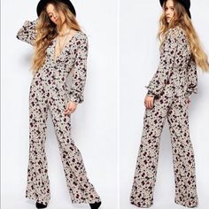 Brand New With Tags Deep V-Neck With Floral Pattern & Long Sleeves Pantsuit/Jumpsuit Stretchy Ruffled Band Around Waist Colors: Cream, Burgundy, And Black Size 6 (Small) Zipper On Left Side And Two Clasps On Chest 52% Viscose, 48% Rayon Beautiful Print & Material Smoke & Pet Free Home! Bundle To Save! Summer Long Sleeve Fitted Pantsuit, Fitted Long Sleeve Summer Pantsuit, Floral Print Long Sleeve Jumpsuits For Fall, Long Sleeve Floral Jumpsuit For Fall, Chic Floral Print Jumpsuits And Rompers For Fall, Chic Floral Print Jumpsuits For Fall, Floral Print Jumpsuits And Rompers For Spring Workwear, Spring Party Beige Jumpsuits And Rompers, Spring Party Jumpsuits And Rompers In Beige