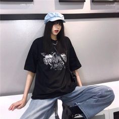 Сasual Egirl T-shirt | black - Shoptery Black T-shirt For Spring Streetwear, Black Punk Style T-shirt For Spring, Black Punk T-shirt For Spring, Trendy Black Top For Streetwear, Black Edgy T-shirt For Spring, Black T-shirt For Concerts In Spring, Black T-shirt For Spring Concert, Oversized Black Punk Tops, Casual Black T-shirt For Concert