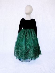 A gorgeous dress that can be worn for a Christmas party, birthday, photoshoot, or pageant! Long sleeve bodice is made out of soft velvet. The zipper can be found on the back of the dress. Comes with a detachable embroidery bow. The skirt is made out of a detailed embroidery fabric with lining underneath. One last layer of lining with crinoline attached underneath everything to give the dress shape. *Mannequin has petticoat to show detail. !PETTICOAT NOT INCLUDED! LINK TO PURCHASE PETTICOAT: http Dark Green Flower Girl Dresses, Emerald Green Dress Long, Pageant Photoshoot, Long Sleeve Black Gown, Infant Flower Girl, Embroidery Bow, Formal Chic, Blush Gown, Party Photoshoot