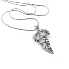 The signature sterling silver leaf pendant that started it all. A perfect every day accessory for your positive mindset. Each time you wear it, you will be reminded of your own personal gifts.  Model is wearing a 16 inch chain length. Also available in an 18 inch length. Inspiration: To prosper, we adapt. Marie Livet took inspiration from a rare Victorian Era mold originally used to make couture silk flowers and transformed it into this signature pendant. It was saved from being forgotten in this modern changing world. Now, this long lost piece of art has a new life, representing the triumph we can achieve through personal growth and adaptation. All while remaining true to our own innate talents and charm. Sterling Silver Everyday Necklace With Nature-inspired Style, Everyday Sterling Silver Nature-inspired Necklace, Everyday Nature-inspired Sterling Silver Necklace, Silver Nature-inspired Necklace For Everyday, Everyday Silver Necklace With Nature-inspired Style, Everyday Silver Nature-inspired Necklace, Everyday Nature-inspired Silver Necklace, Everyday Sterling Silver Leaf Jewelry, Silver Leaf-shaped Sterling Silver Necklace