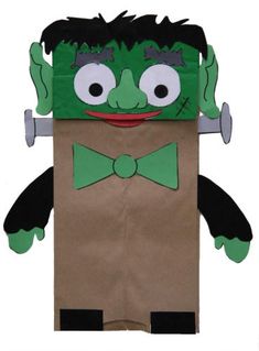 a paper bag with an image of a green monster in it's head and hands